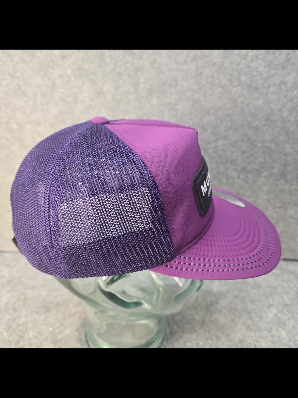 Municipal purple trucker